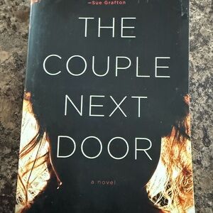 The Couple Next Door Paperback